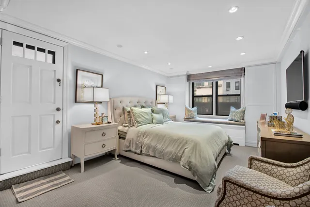 a bathroom with a shower and a sink