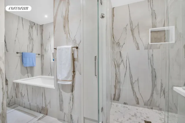 a bathroom with a double vanity sink mirror and double