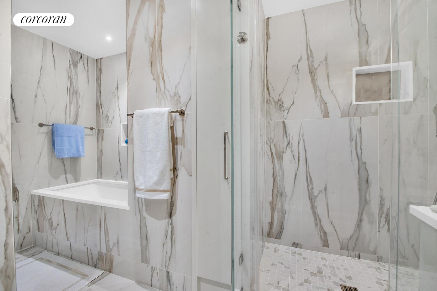 241 East 76th Street, Unit 2HI Manhattan, NY 10021 - Photo 8 of 27 a bathroom with a shower