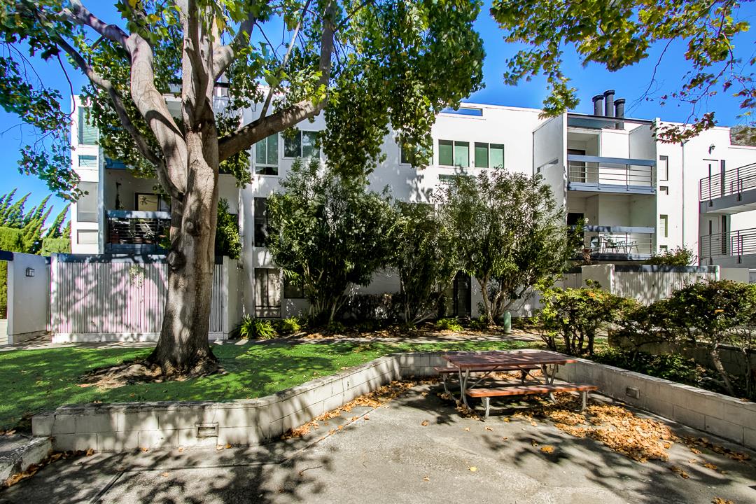 1049 Shell Boulevard, Unit 3 Foster City, CA 94404 - Photo 29 of 56 a view of a chairs and table in a backyard