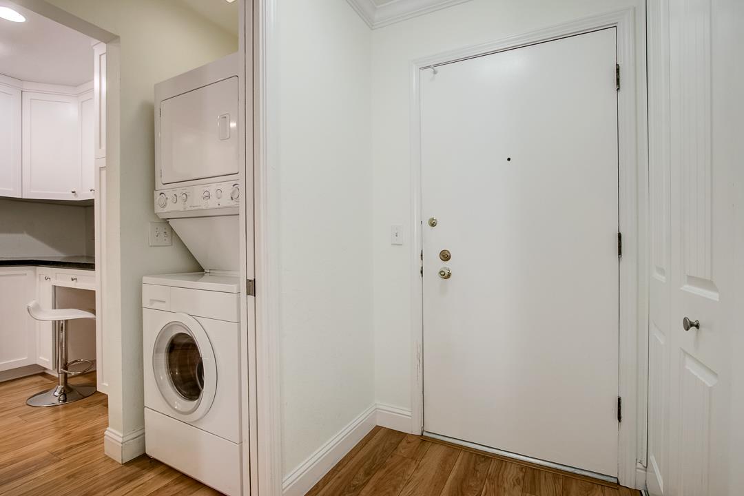 1049 Shell Boulevard, Unit 3 Foster City, CA 94404 - Photo 3 of 56 a view of a hallway with washer and dryer