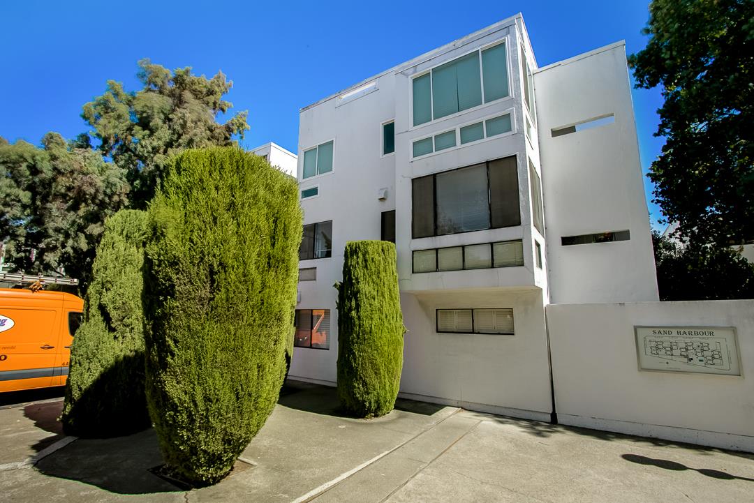 1049 Shell Boulevard, Unit 3 Foster City, CA 94404 - Photo 35 of 56 a front view of a house with a yard