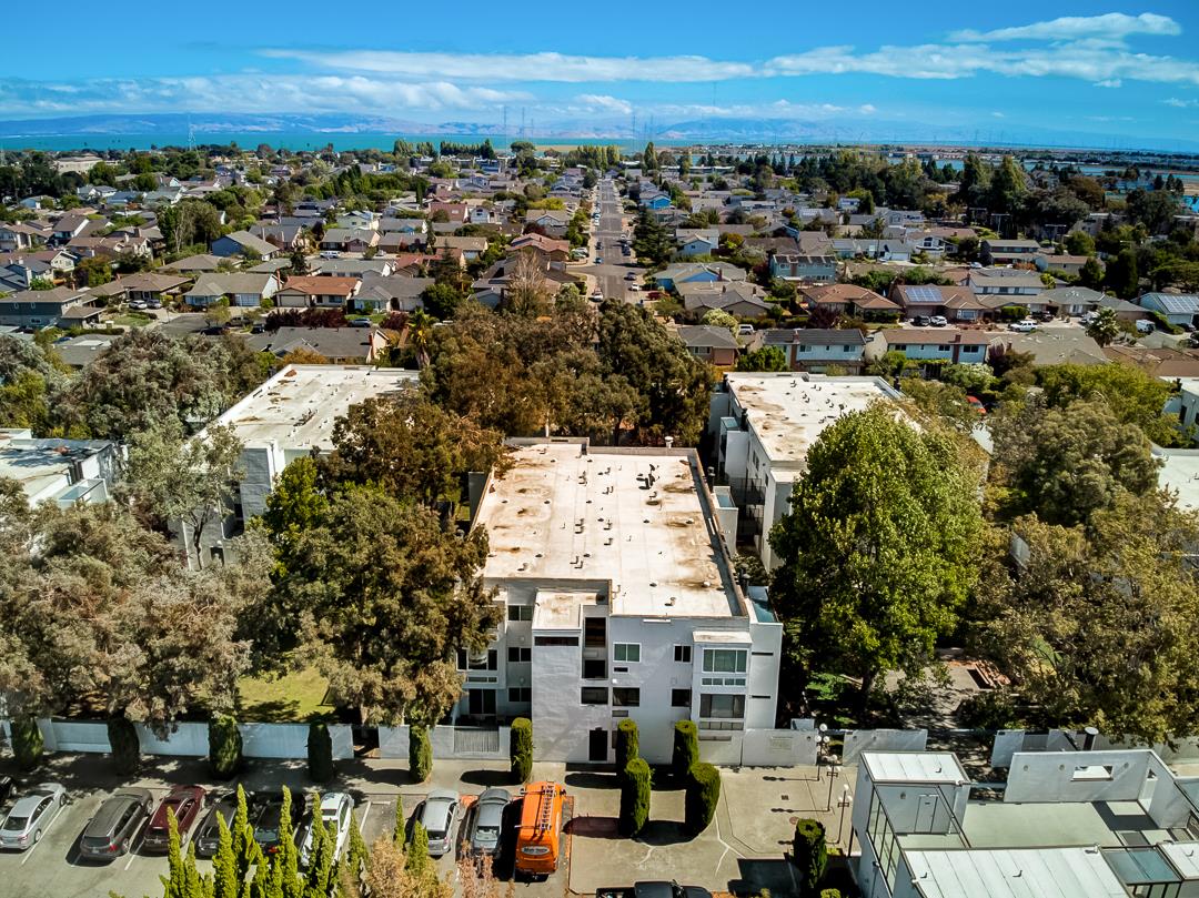 1049 Shell Boulevard, Unit 3 Foster City, CA 94404 - Photo 42 of 56 an aerial view of residential building with outdoor space