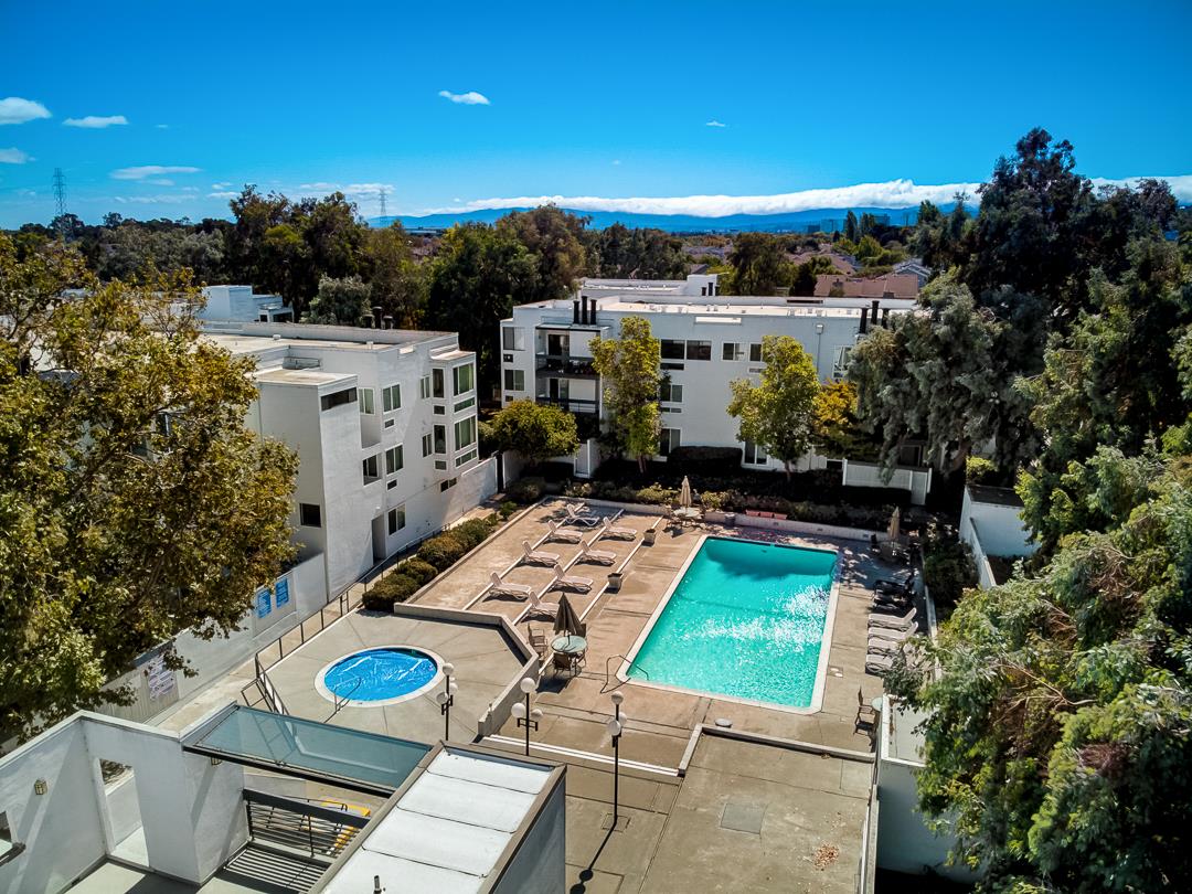 1049 Shell Boulevard, Unit 3 Foster City, CA 94404 - Photo 46 of 56 a view of a chairs and table in backyard