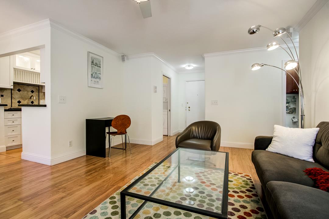 1049 Shell Boulevard, Unit 3 Foster City, CA 94404 - Photo 6 of 56 a living room with furniture and wooden floor