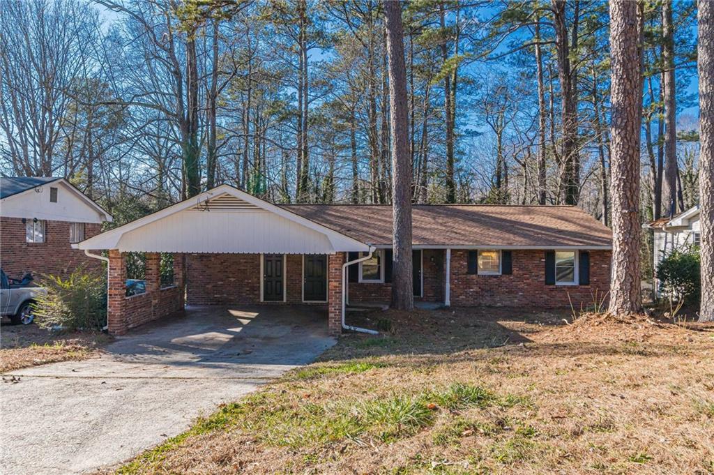 a house with trees in front of it