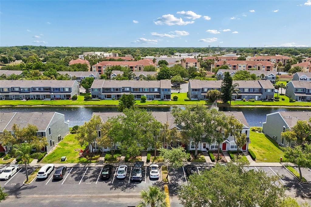 382 Countryside Key Boulevard Oldsmar, FL 34677 - Photo 44 of 58 a view of a city with lawn chairs