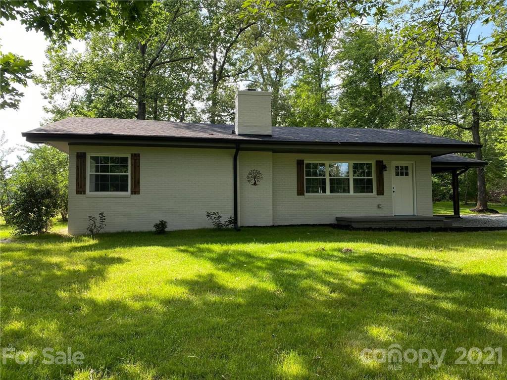 629 Thompson Road Rutherfordton, NC 28139 - Photo 1 of 10 a view of a house with a backyard