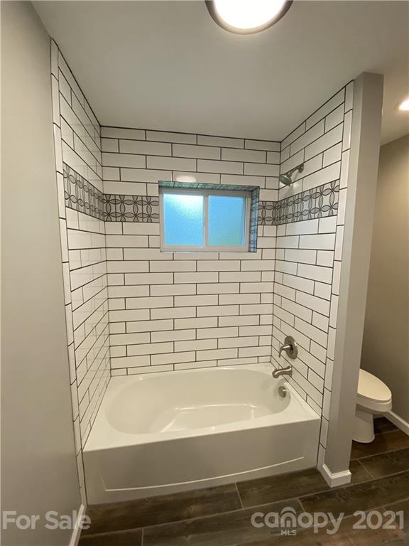 629 Thompson Road Rutherfordton, NC 28139 - Photo 6 of 10 a bathroom with a bathtub and a shower