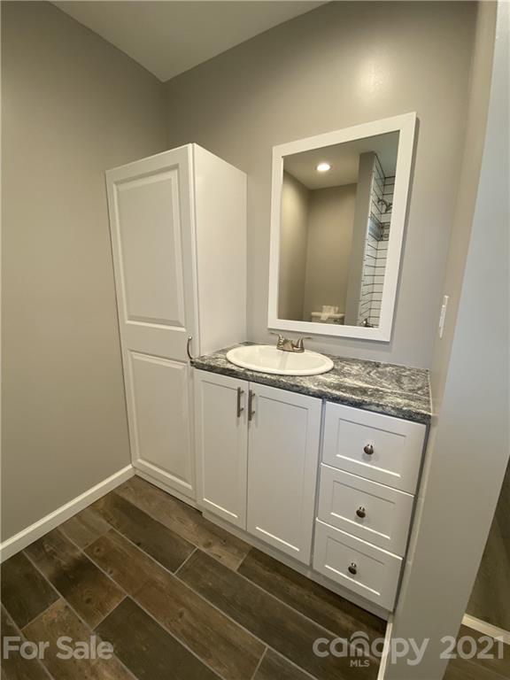 629 Thompson Road Rutherfordton, NC 28139 - Photo 7 of 10 a bathroom with a sink and a mirror
