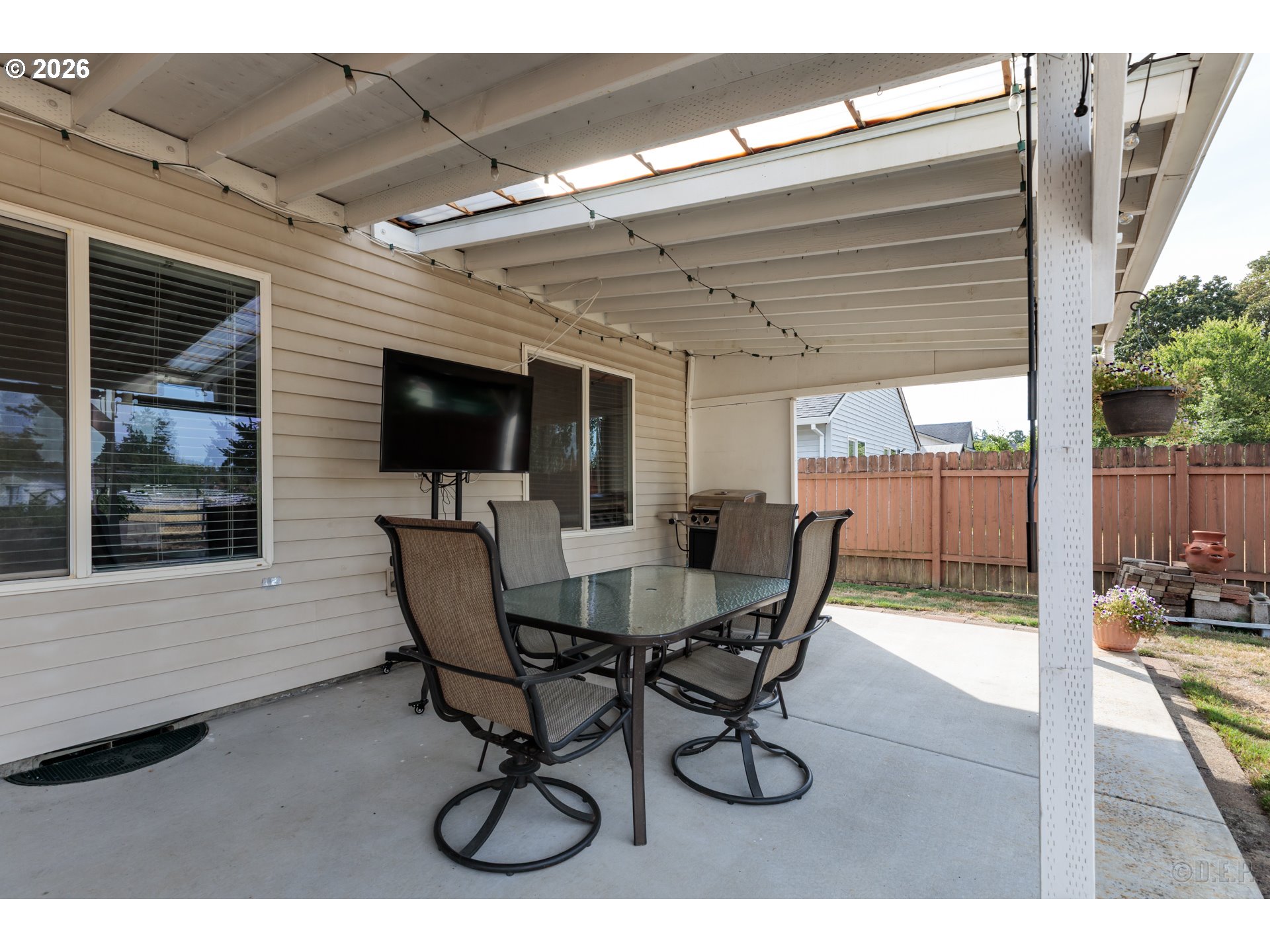 58959 Alexandra Lane St. Helens, OR 97051 - Photo 14 of 19 a view of a dining room with furniture and wooden floor
