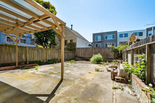 a view of a building with a street