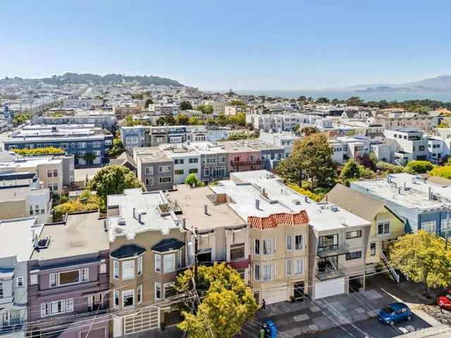 a view of city with tall buildings