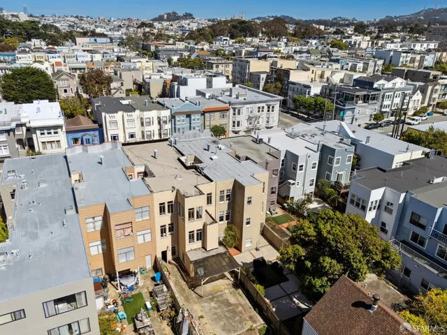 an aerial view of multiple house