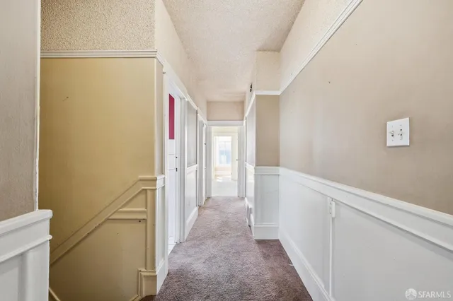 a view of hallway with stairs