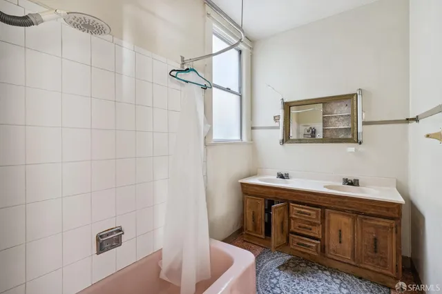 a bathroom with a sink and toilet