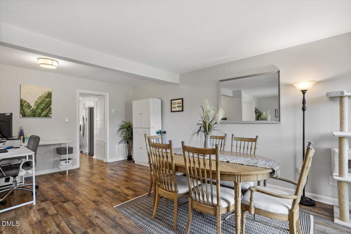 5045 Tall Pines Court Raleigh, NC 27609 - Photo 12 of 37 a view of a dining room with furniture