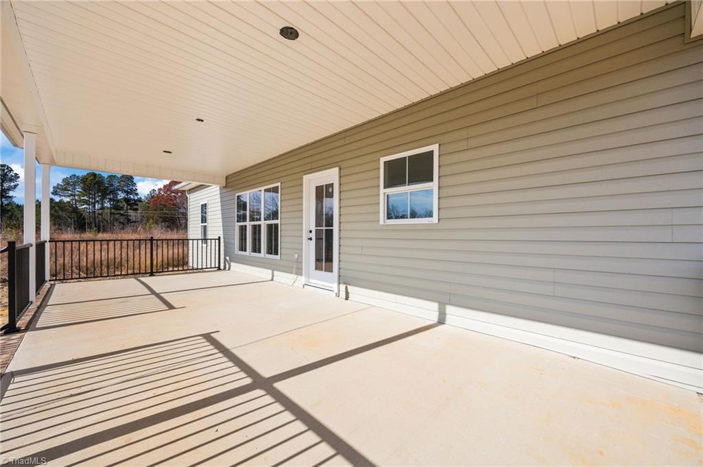 2225 Hughes Mill Road Burlington, NC 27217 - Photo 30 of 49 Covered Back Porch