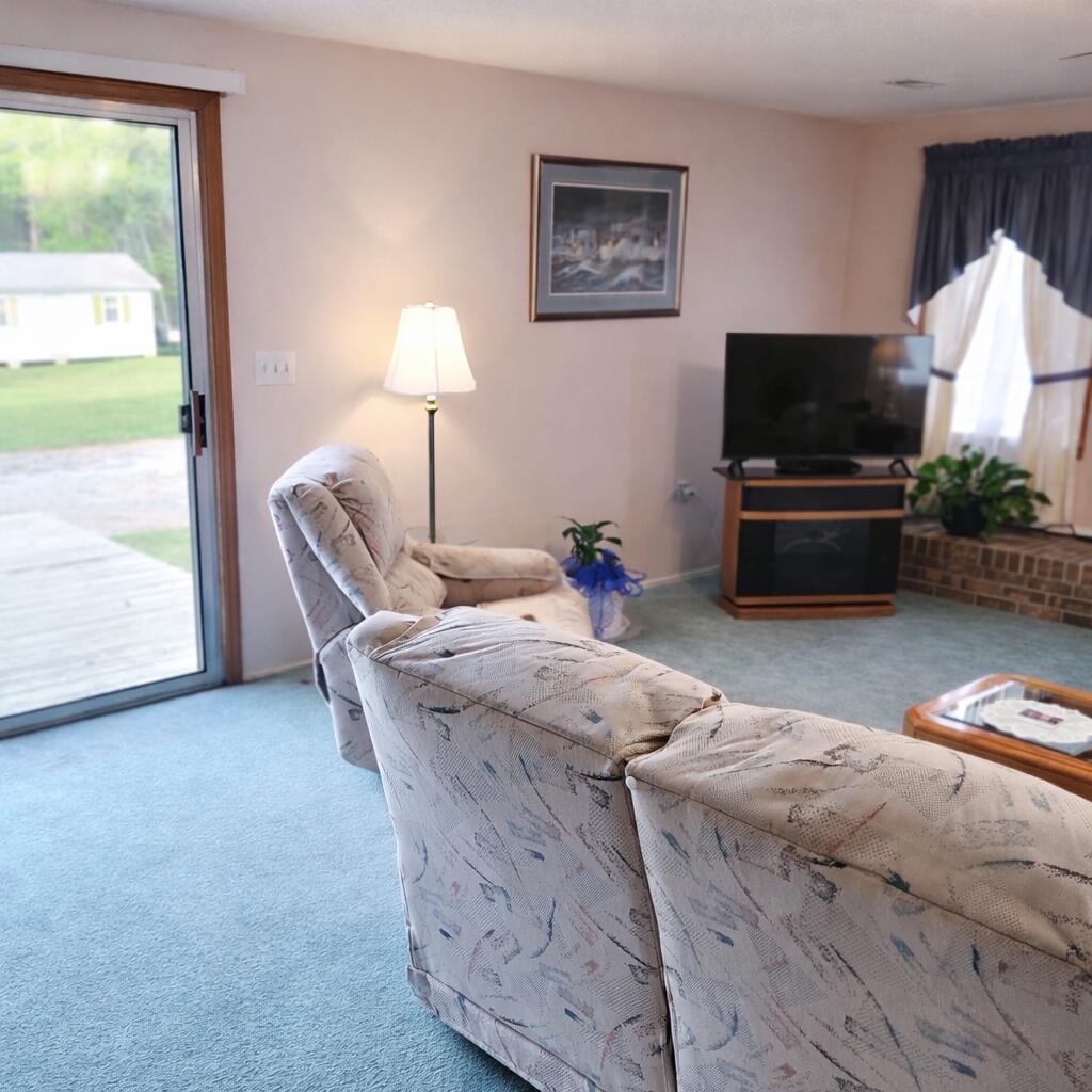 5497 Old Highway, Unit SIX Elloree, SC 29047 - Photo 15 of 30 Family Room with Doors to Deck