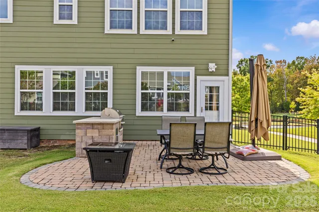 swimming pool view with a lake view
