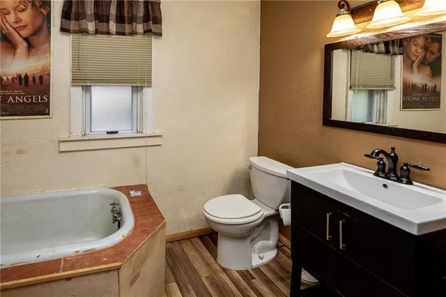 a bathroom with a sink and a toilet