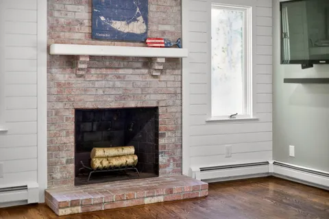 a living room with a fireplace