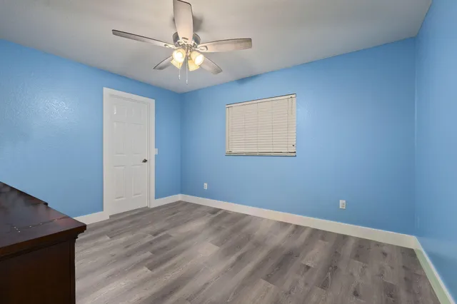 a bathroom with a shower and a shower