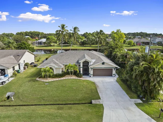 an aerial view of a house with garden
