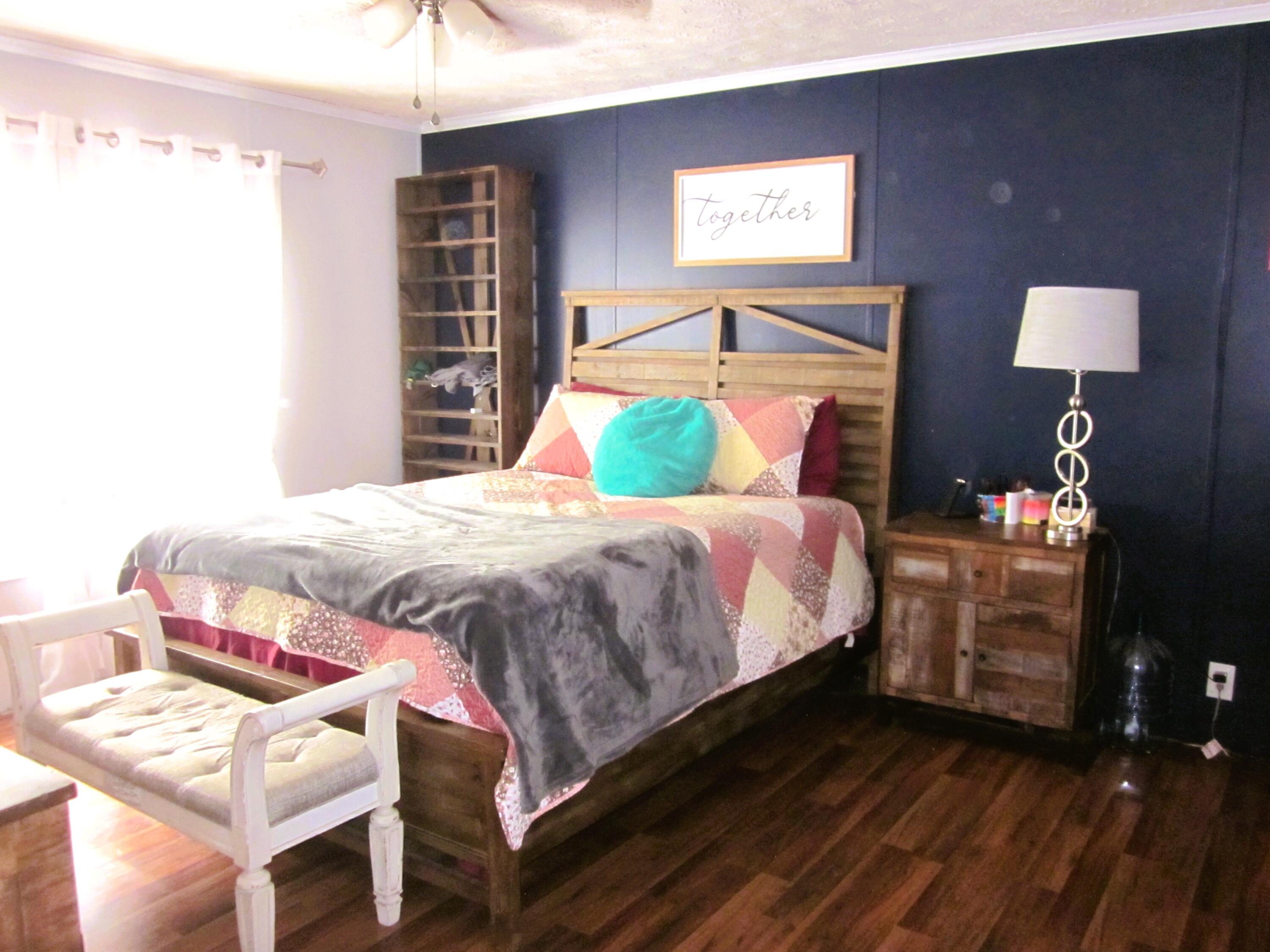 177 Carolina Road Rocky Mount, VA 24151 - Photo 14 of 24 a bedroom with a bed and a table in it