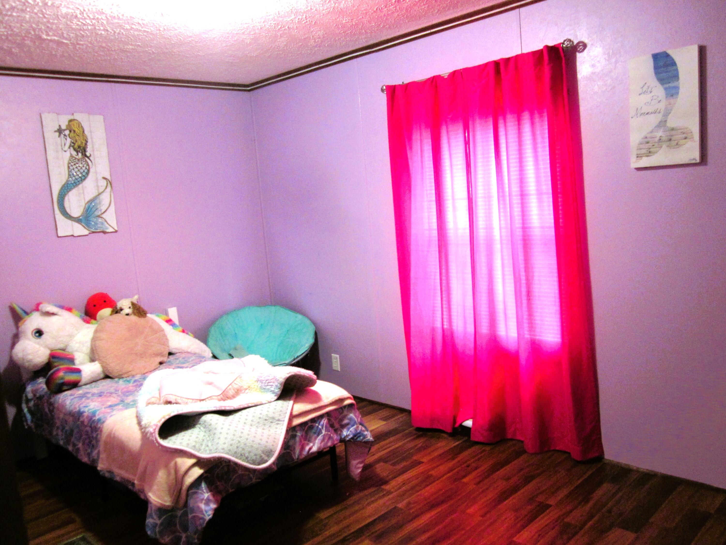 177 Carolina Road Rocky Mount, VA 24151 - Photo 20 of 24 a bedroom with a bed and a window