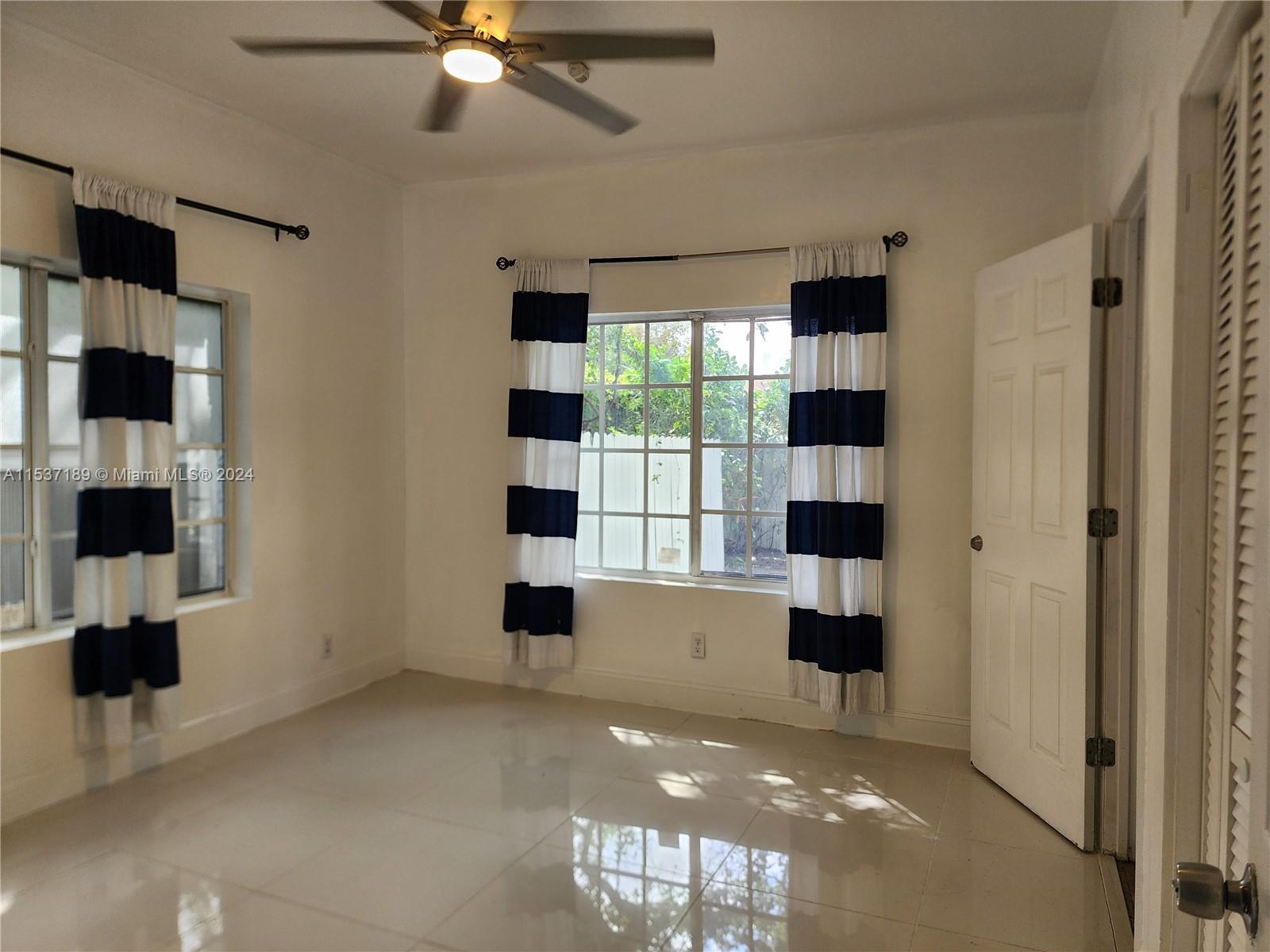 Buena Vista Miami, FL 33127 - Photo 11 of 19 a view of kitchen with a refrigerator and microwave