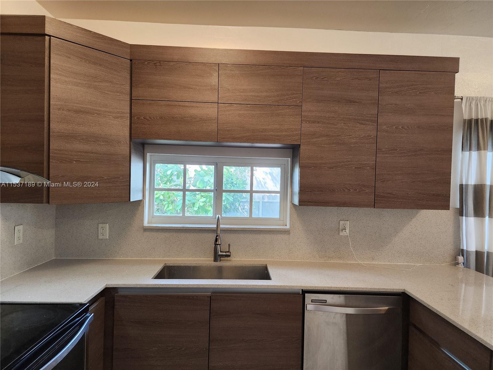 Buena Vista Miami, FL 33127 - Photo 5 of 19 a kitchen with a sink and a window