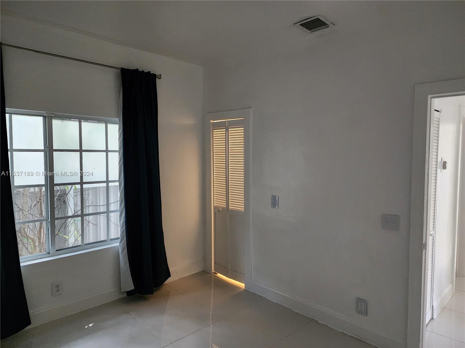 Buena Vista Miami, FL 33127 - Photo 9 of 19 an empty room with windows