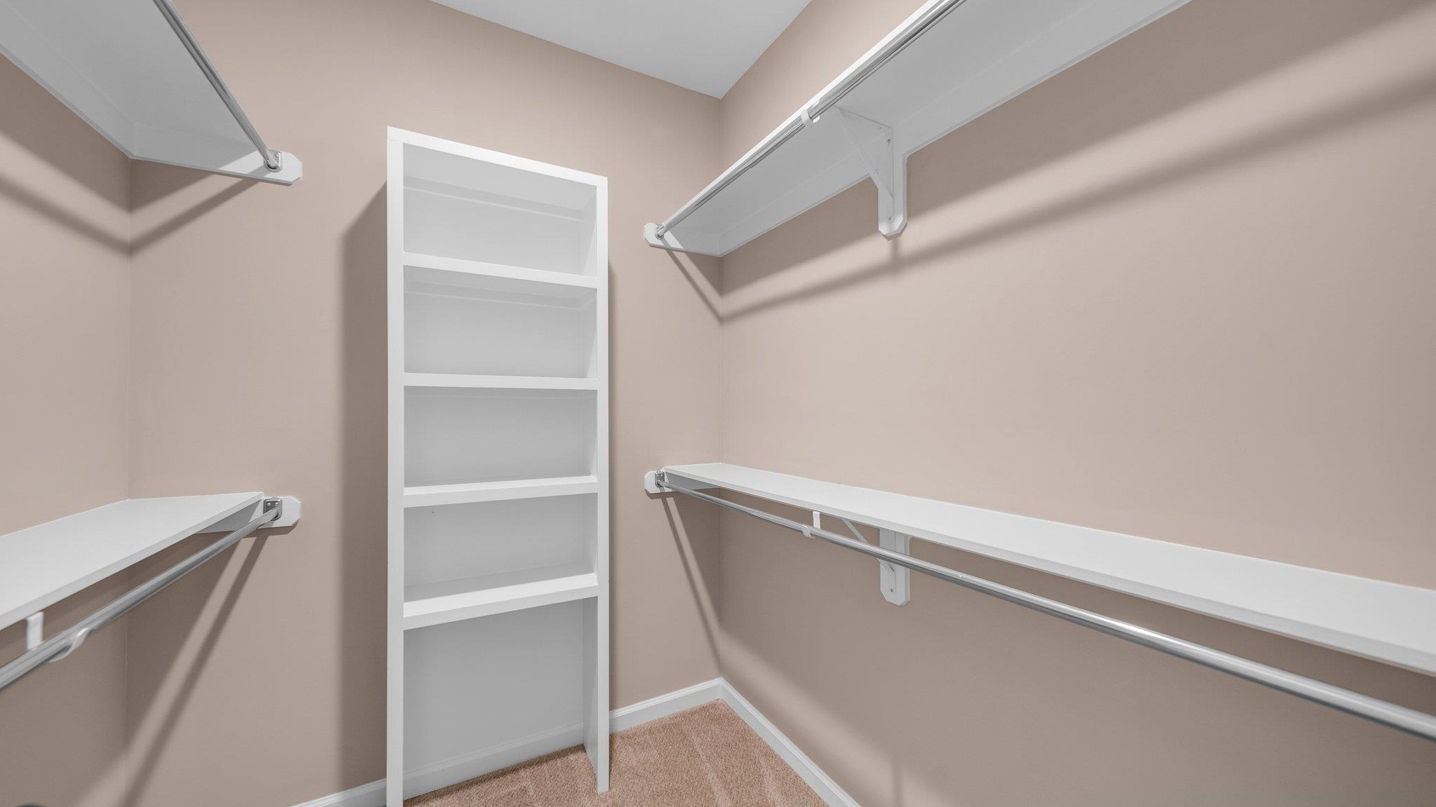 152 York Commons Cove Ripley, TN 38063 - Photo 14 of 39 Spacious closet featuring light colored carpet