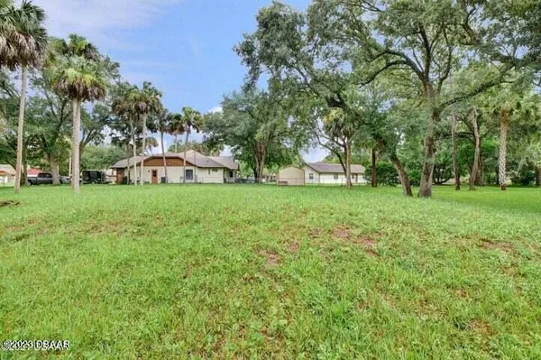 a view of a house with a big yard