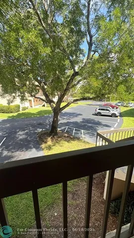 a view of swimming pool from a balcony