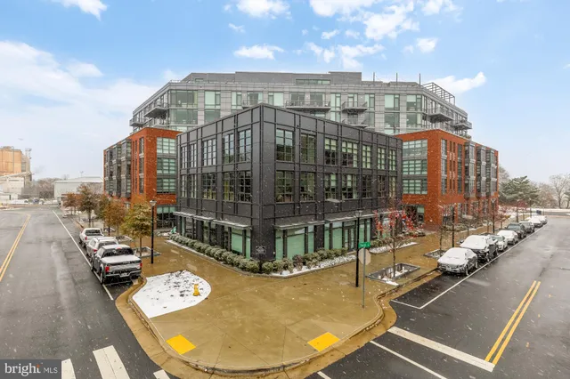 a view of a balcony with sitting area