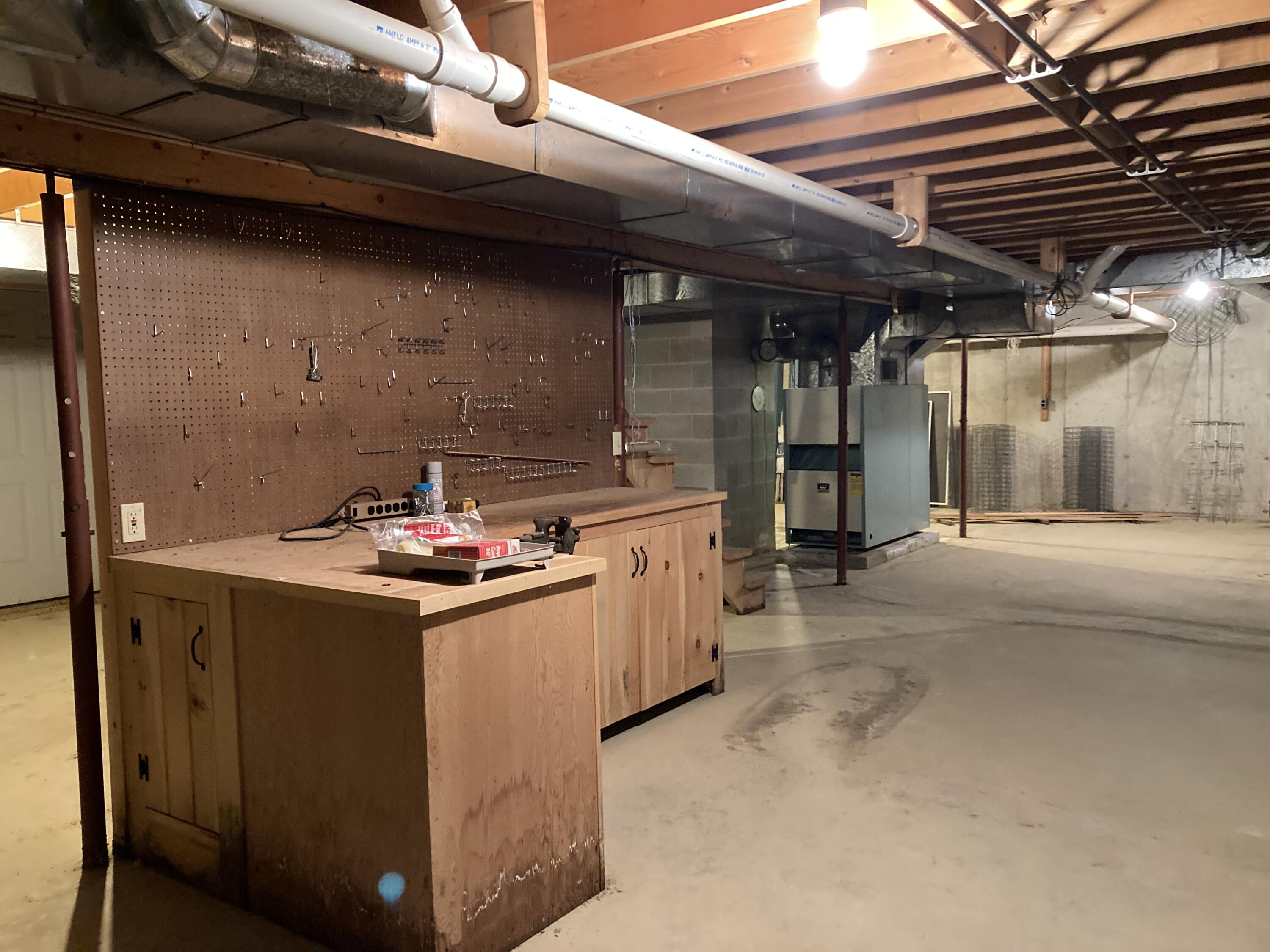 19 Shop Hill Road Milbridge, ME 04658 - Photo 30 of 45 Work bench in basement.