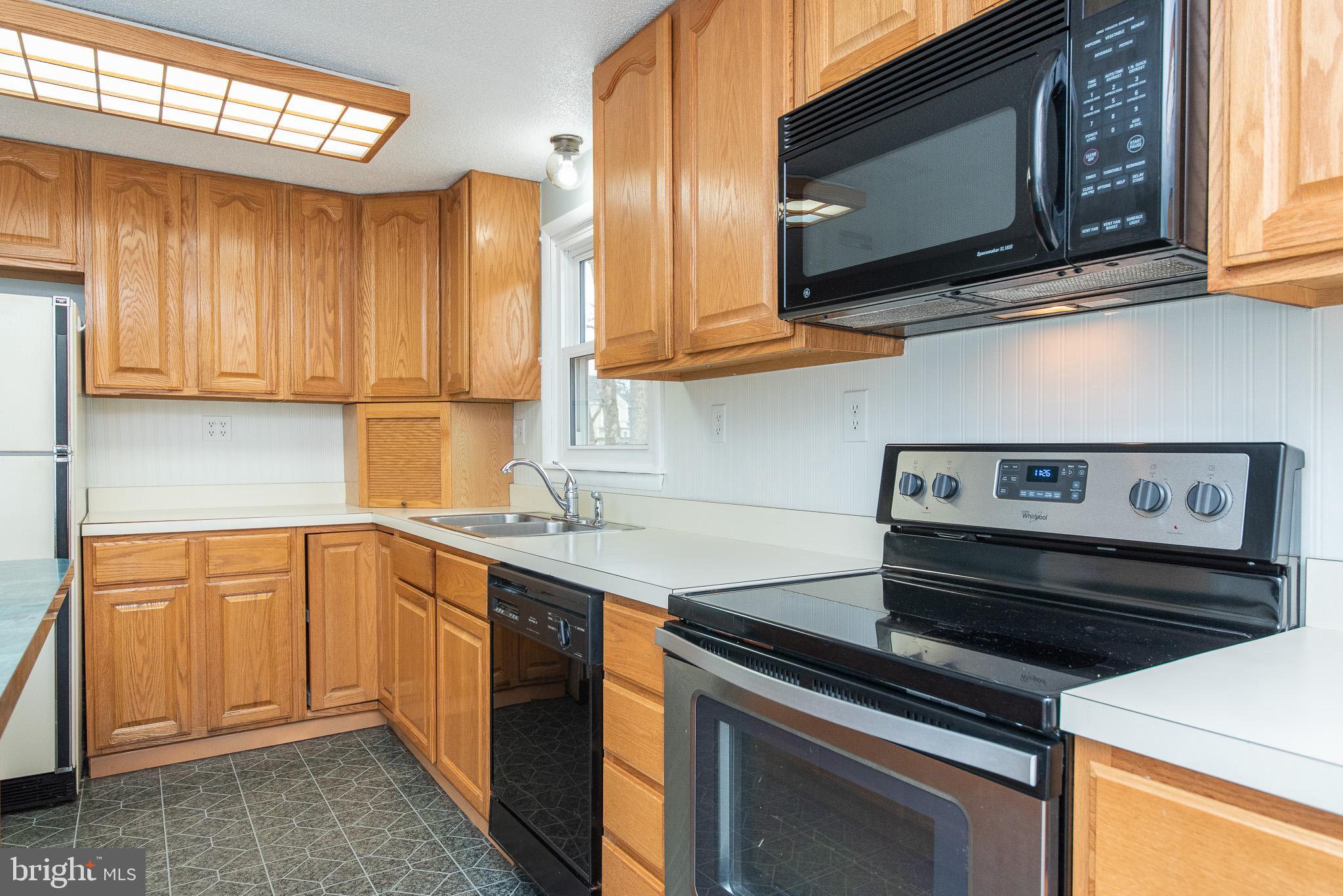 4330 Church Road Manchester, MD 21102 - Photo 2 of 38 Main level kitchen with stainless steel stove