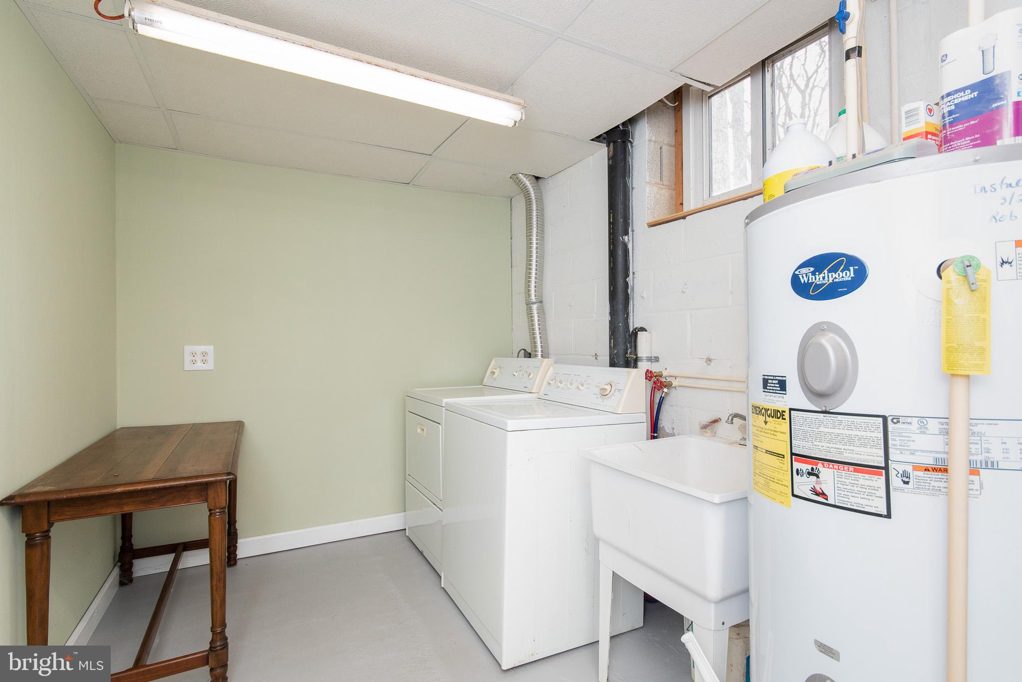 4330 Church Road Manchester, MD 21102 - Photo 28 of 38 Large, shared laundry area with washer & dryer