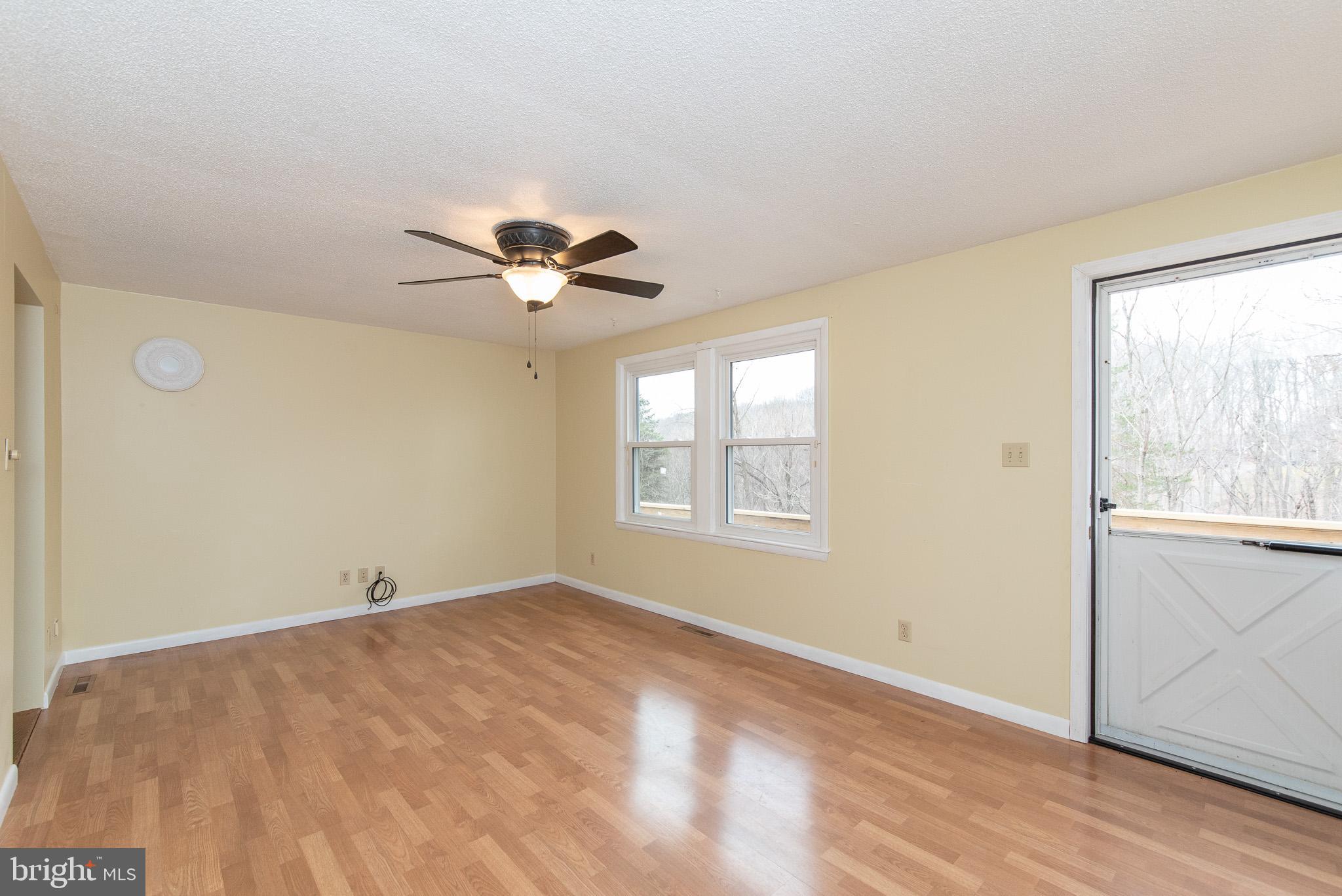 4330 Church Road Manchester, MD 21102 - Photo 8 of 38 Main level light -filled living room