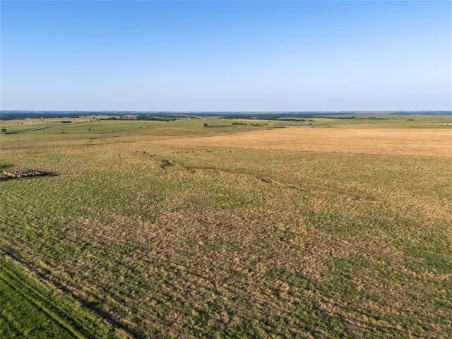 a view of an ocean with beach