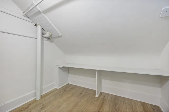 a view of an empty walk in closet