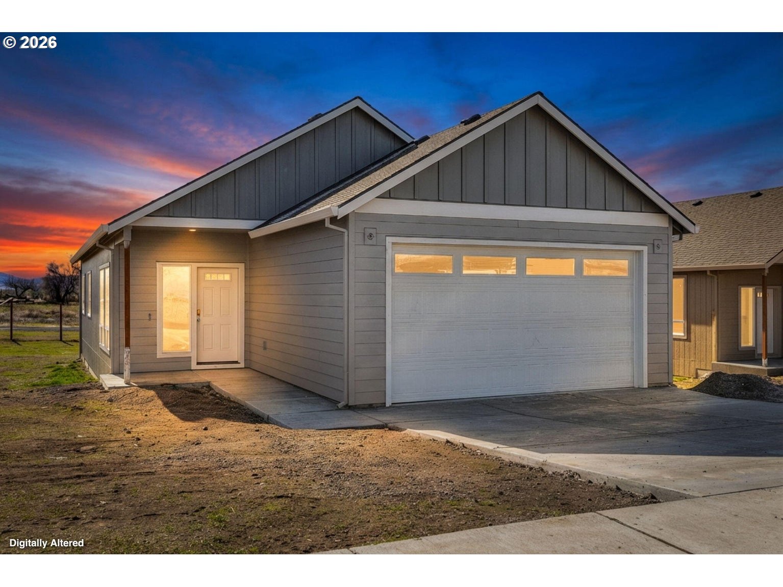 516 Southwest 6th Street Madras, OR 97741 - Photo 1 of 11 a front view of a house with a yard