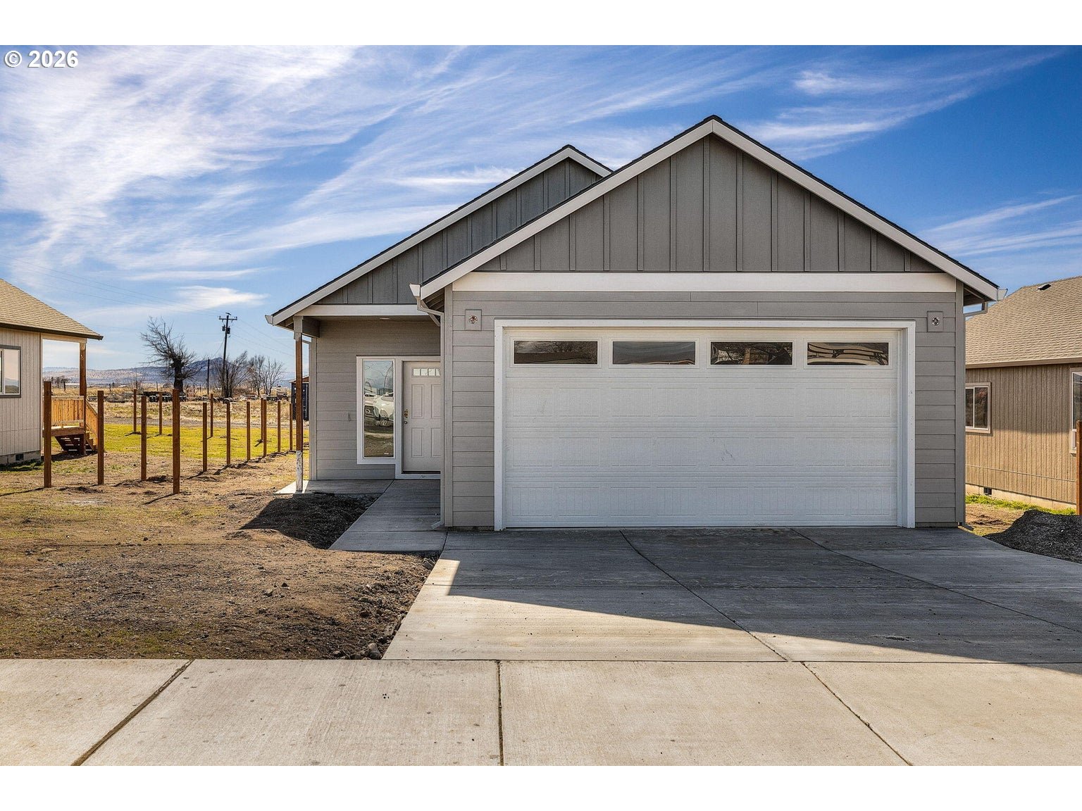 516 Southwest 6th Street Madras, OR 97741 - Photo 2 of 11 a front view of a house with a yard