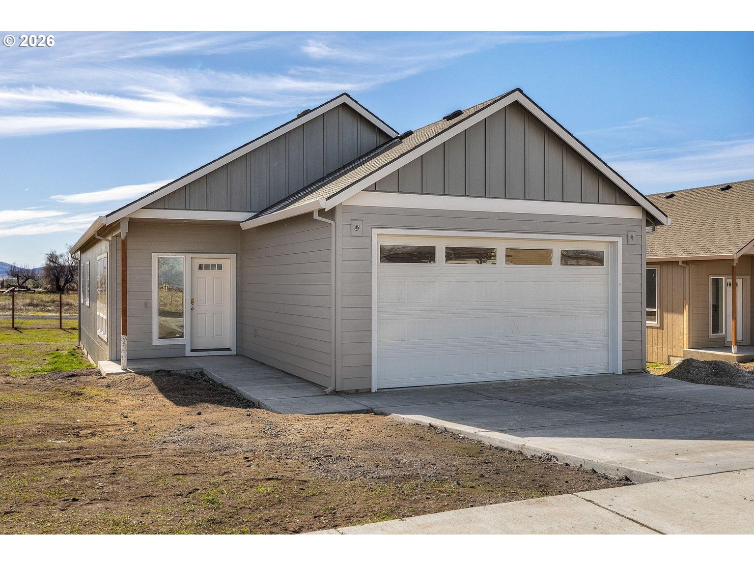 516 Southwest 6th Street Madras, OR 97741 - Photo 10 of 11 a front view of a house with a yard