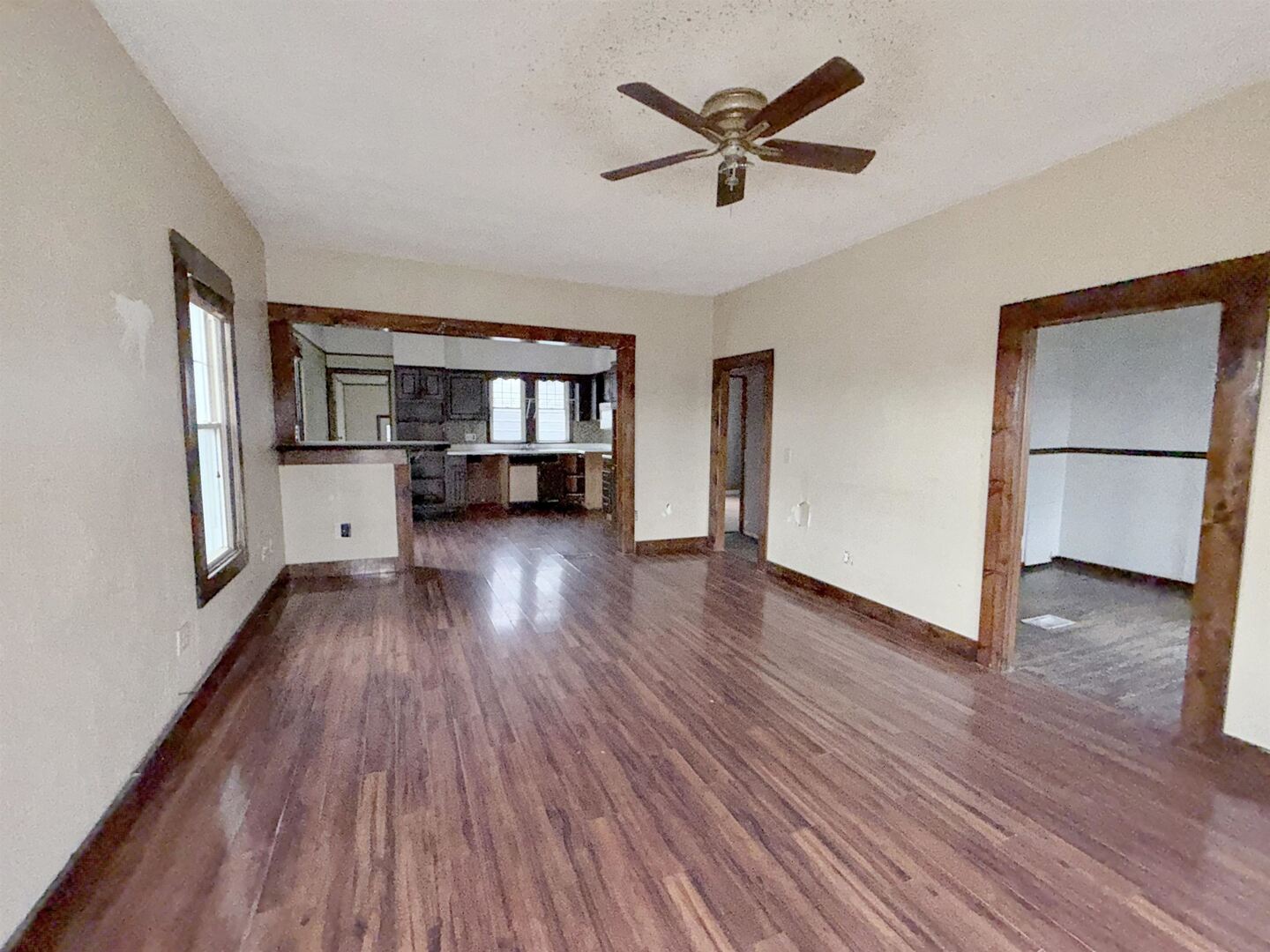 220 South 14th Street Murphysboro, IL 62966 - Photo 3 of 11 a view of a living room with wooden floor and a ceiling fan