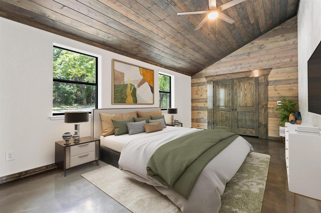 516 County Road Honey Grove, TX 75446 - Photo 16 of 27 a bedroom with a large bed and a large window with outer view