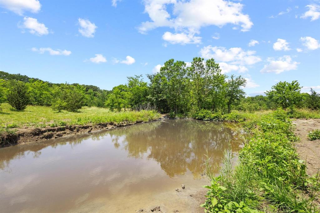 516 County Road Honey Grove, TX 75446 - Photo 23 of 27 a view of a lake