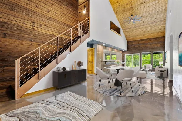 a view of a patio with couches table and chairs